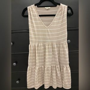 Tan and white striped dress. Size medium. Gently used.